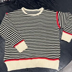Striped Black and Cream Sweater with Red Accents